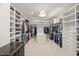 This is a large walk-in closet with ample shelving and drawers for optimal storage at 109 Greenock Ct, Cary, NC 27511