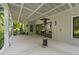 Covered patio with ceiling fan, heater and outdoor lighting perfect for entertaining at 109 Greenock Ct, Cary, NC 27511