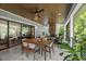 Inviting covered porch with fireplace and comfortable seating area at 109 Greenock Ct, Cary, NC 27511