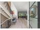 Bright foyer featuring brick accent wall, modern staircase and stylish front door at 109 Greenock Ct, Cary, NC 27511