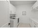 A laundry room with a washer and dryer at 109 Greenock Ct, Cary, NC 27511