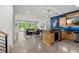 A spacious living room area with a modern bar and entertainment setup at 109 Greenock Ct, Cary, NC 27511