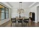Formal dining room with modern lighting and stylish decor at 1141 Duke Farm Dr, Wake Forest, NC 27587