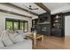 Inviting living room features a fireplace, built-in shelves, and a sliding glass door at 1141 Duke Farm Dr, Wake Forest, NC 27587