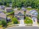 Beautiful two-story home with a two-car garage, landscaped yard, and mature trees in a well-maintained neighborhood at 118 Fox Run Ct, Durham, NC 27705