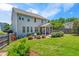 Manicured lawn with brick pavers and landscaped yard, perfect for outdoor relaxation at 118 Fox Run Ct, Durham, NC 27705