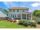 Large landscaped backyard provides a wonderful outdoor area for entertaining or relaxing at 118 Fox Run Ct, Durham, NC 27705