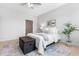 Calm, airy bedroom featuring neutral tones, rug and natural light at 118 Fox Run Ct, Durham, NC 27705