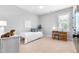 Comfortable secondary bedroom with desk and natural light at 118 Fox Run Ct, Durham, NC 27705