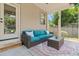 Relaxing screened patio with comfortable seating and outdoor decor at 118 Fox Run Ct, Durham, NC 27705