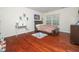Bedroom with hardwood floors, desk and gamer decor at 1209 Partington St, Wake Forest, NC 27587