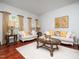 Bright living room with a decorative coffee table and couches at 1209 Partington St, Wake Forest, NC 27587