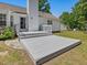 Inviting back deck of a bright, two-story home, perfect for outdoor relaxation and entertainment at 1230 Piney Glen Ln, Zebulon, NC 27597