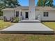 Charming backyard deck features a bright white trim, creating an ideal spot for outdoor enjoyment at 1230 Piney Glen Ln, Zebulon, NC 27597