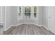 Charming eat-in nook featuring a bay window, wooden blinds, stylish flooring, and neutral paint at 1230 Piney Glen Ln, Zebulon, NC 27597
