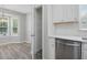 Eat-in kitchen with stainless appliances, white cabinets and eat in nook with lots of natural light at 1230 Piney Glen Ln, Zebulon, NC 27597