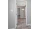 View of living space through doorway, showing stylish flooring and an inviting atmosphere at 1230 Piney Glen Ln, Zebulon, NC 27597