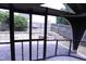 Screened in back porch overlooking multi tiered backyard is perfect for entertaining at 126 Willow Weald Ct, Fuquay Varina, NC 27526