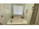 This bathroom features a large soaking tub and a separate shower at 126 Willow Weald Ct, Fuquay Varina, NC 27526