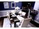 Cozy dining area with elegant furnishings, artwork, and convenient proximity to the kitchen for easy serving at 126 Willow Weald Ct, Fuquay Varina, NC 27526
