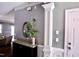 Charming foyer featuring decor details, granite-topped cabinet, and neutral grey walls at 126 Willow Weald Ct, Fuquay Varina, NC 27526