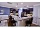 Stylish kitchen with granite counters, stainless steel appliances, and breakfast bar at 126 Willow Weald Ct, Fuquay Varina, NC 27526