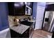 Modern kitchen boasts granite countertops, stainless steel appliances, and efficient layout for culinary enthusiasts at 126 Willow Weald Ct, Fuquay Varina, NC 27526