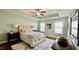 Relaxing main bedroom includes tray ceilings, natural light, and ample space for comfortable living and relaxation at 126 Willow Weald Ct, Fuquay Varina, NC 27526