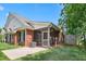 A beautiful brick home with a screened-in porch and well-maintained lawn, perfect for outdoor living at 127 Bobwhite Way, Mebane, NC 27302