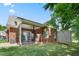 Brick home with screened-in porch and a lawn, perfect for outdoor activities at 127 Bobwhite Way, Mebane, NC 27302