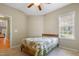 Simple bedroom featuring carpet, a ceiling fan, and neutral tones for a cozy ambiance at 127 Bobwhite Way, Mebane, NC 27302