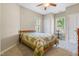 Cozy bedroom with neutral tones, carpet, and sun-filled windows creating a warm space at 127 Bobwhite Way, Mebane, NC 27302