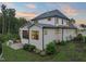 Beautiful backyard featuring an outdoor kitchen with built in grill, a screened porch and lush landscaping at 1409 Montvale Ridge Dr, Cary, NC 27519