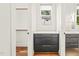 Bright closet with built in storage and a modern vanity at 1409 Montvale Ridge Dr, Cary, NC 27519