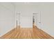 Bright empty room with doors to ensuite bathroom and closet at 1409 Montvale Ridge Dr, Cary, NC 27519