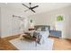 Spacious main bedroom with decorative wall, hardwood floors, and ensuite bathroom with sliding door at 1409 Montvale Ridge Dr, Cary, NC 27519