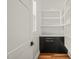 Walk-in pantry featuring custom shelving and ample storage space at 1409 Montvale Ridge Dr, Cary, NC 27519