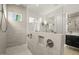 Bright shower room featuring seamless glass and luxurious tile design at 1409 Montvale Ridge Dr, Cary, NC 27519