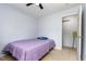 Bedroom featuring a comfortable bed, closet and neutral colored carpet at 141 Weston Rd, Garner, NC 27529