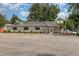 Charming restaurant with a spacious parking lot and inviting outdoor planters at 141 Weston Rd, Garner, NC 27529