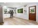 Updated kitchen with stainless appliances, ample cabinet space, and a view of the backyard at 141 Weston Rd, Garner, NC 27529