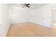 Empty bedroom featuring light wood floors, a ceiling fan, and a neutral color palette at 1605 Bobwhite Ln, Rocky Mount, NC 27804