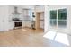 Modern kitchen featuring white cabinets, stainless steel appliances, and a sliding glass door to deck at 1605 Bobwhite Ln, Rocky Mount, NC 27804