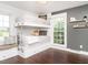 Bedroom featuring custom bunk beds, storage drawers, and window seat at 1625 Haystack Ln, Burlington, NC 27217