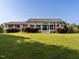 Charming single-story home with lush lawn and inviting front porch, perfect for relaxing outdoors at 1625 Haystack Ln, Burlington, NC 27217