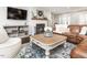 Comfortable living room with shiplap fireplace, built-in shelving, and stylish decor at 1625 Haystack Ln, Burlington, NC 27217
