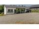 Outbuilding featuring parking for tractors and other vehicles and a white exterior at 1625 Haystack Ln, Burlington, NC 27217