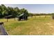 Well-maintained pasture area with modern outbuildings that enhances rural charm and offers practical space at 1625 Haystack Ln, Burlington, NC 27217