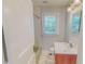 Bathroom with white subway tile in shower/tub combination and marble tile floor at 171 Magnolia Dr, Roxboro, NC 27573