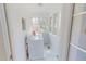 Bright laundry room with ample natural light and a white washer and dryer setup at 171 Magnolia Dr, Roxboro, NC 27573